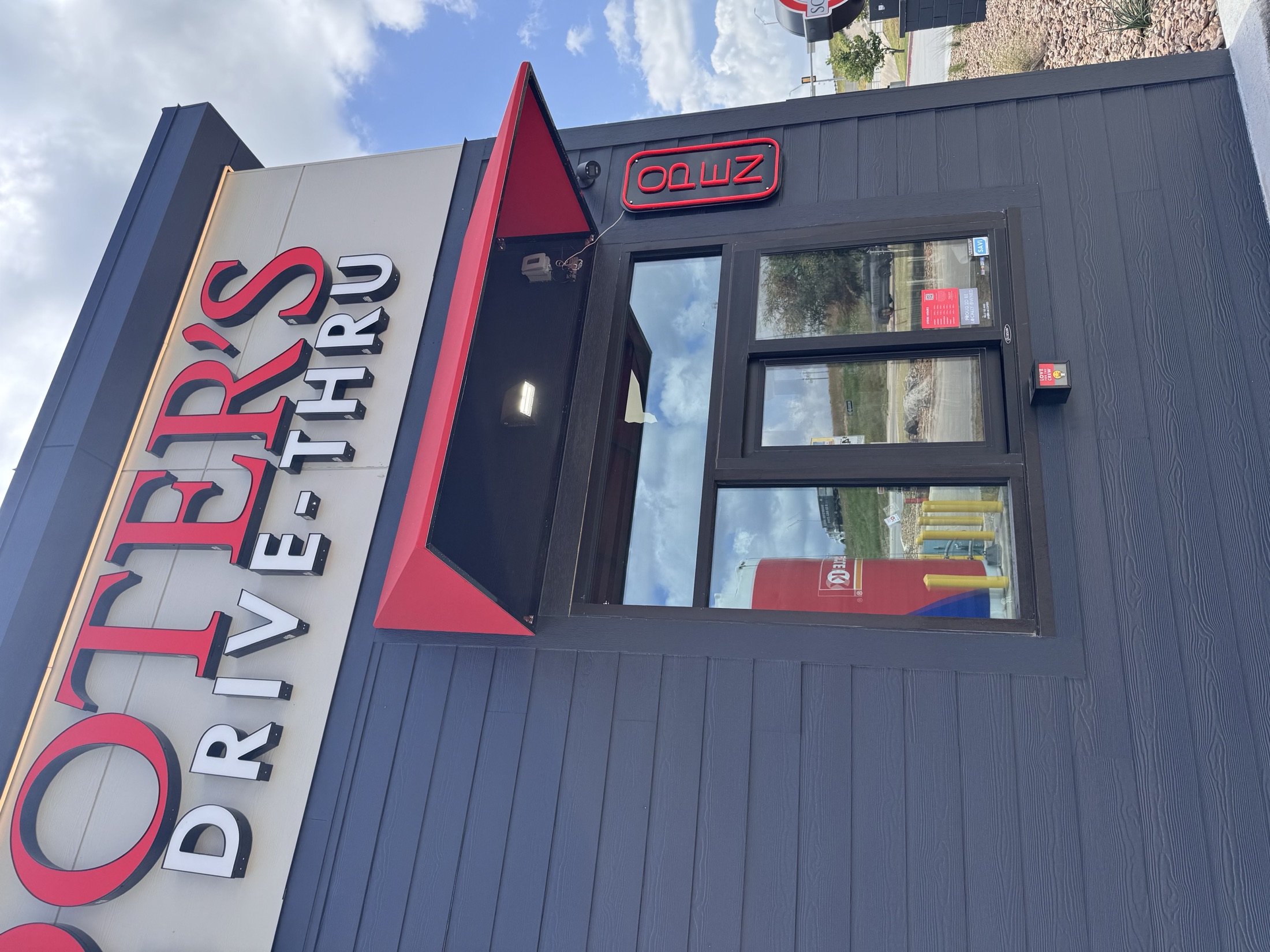 A commercial storefront protected by professionally installed window film